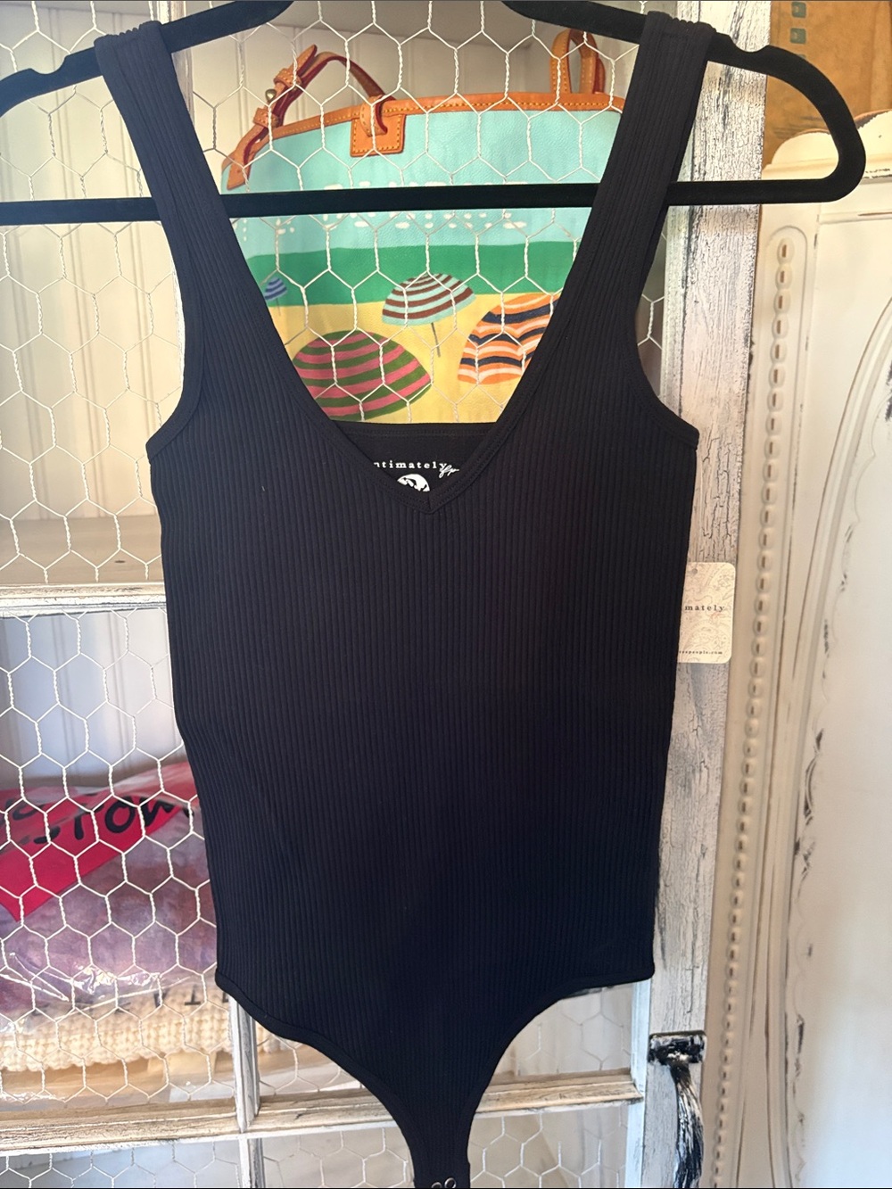 Black Ribbed V-Neck Bodysuit for Women